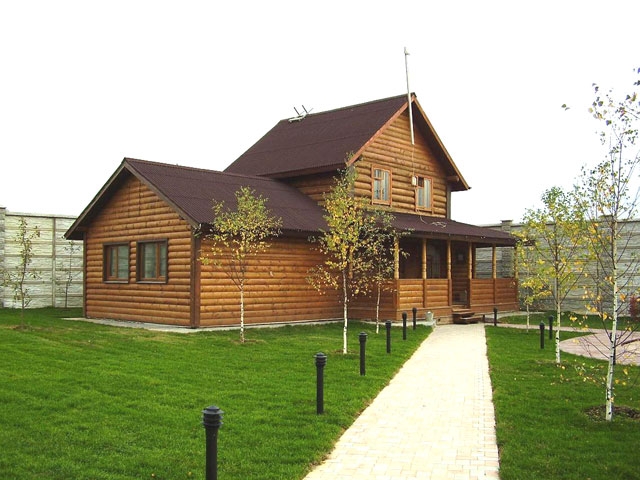 Деревянный дом комбинированной этажности из бревен Amurles.ru